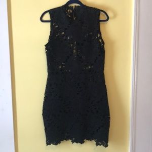Black lace cocktail dress. Very flattering!